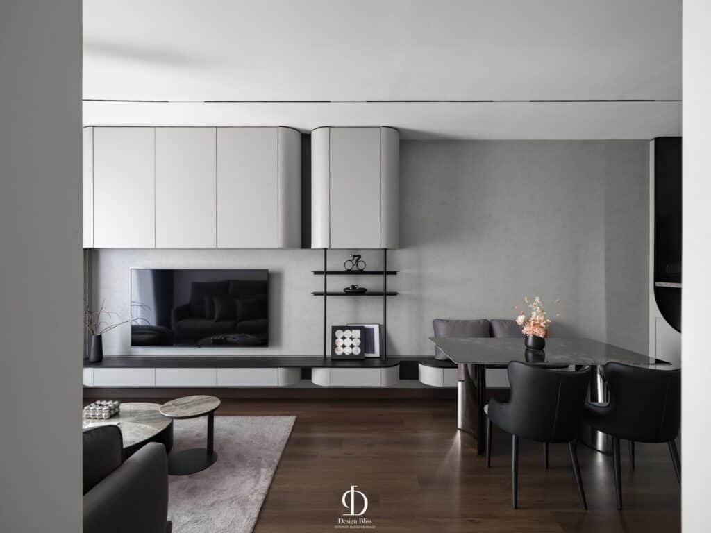 Sleek modern living room with minimalist design, neutral tones, and stylish decor accents.