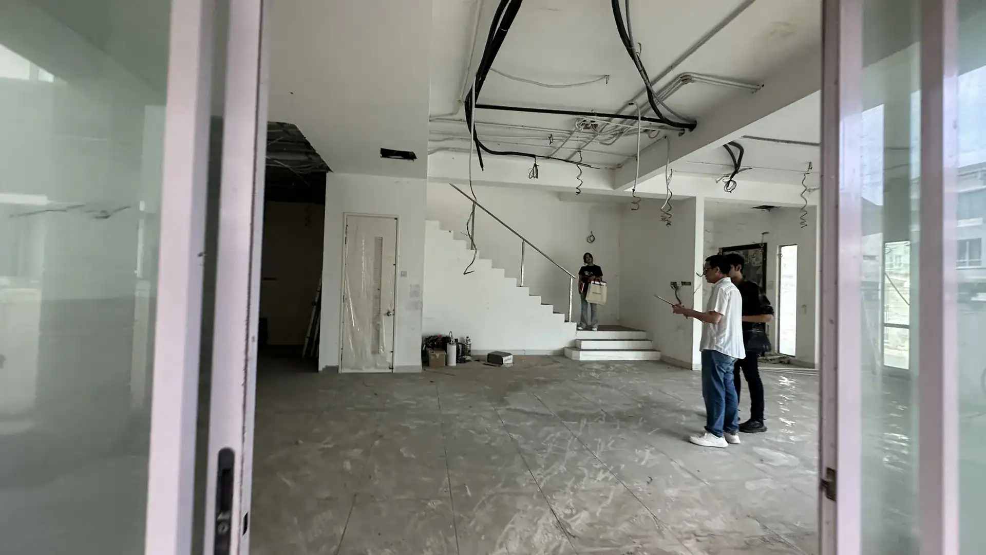 Bright modern interior under construction showcasing contemporary design.